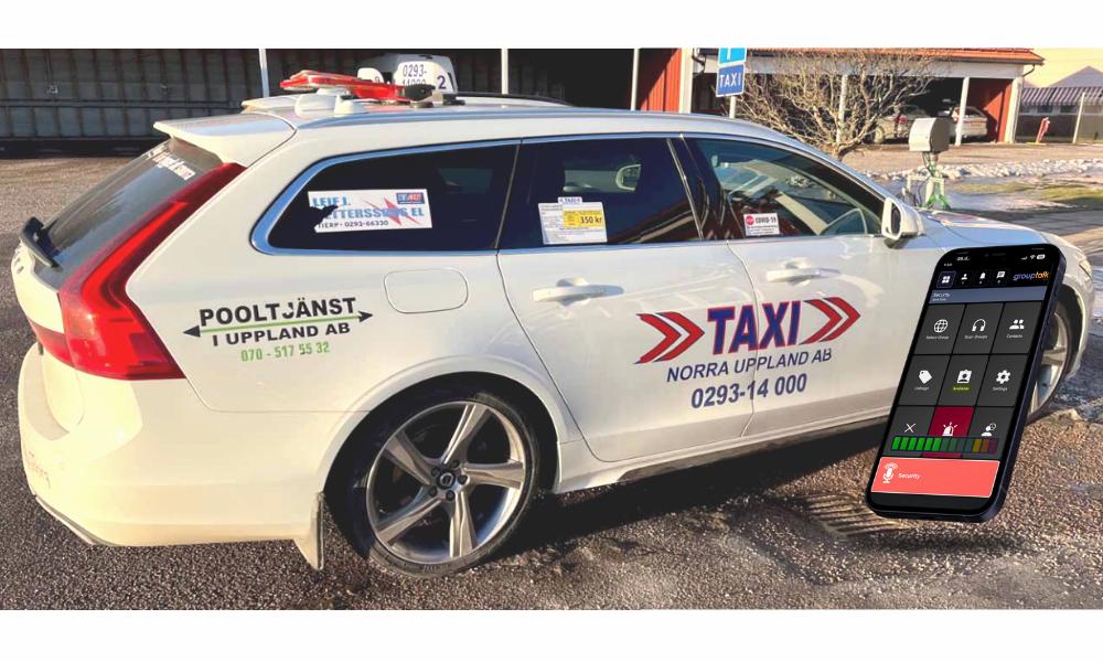 En vit taxibil med iphone och push to talk